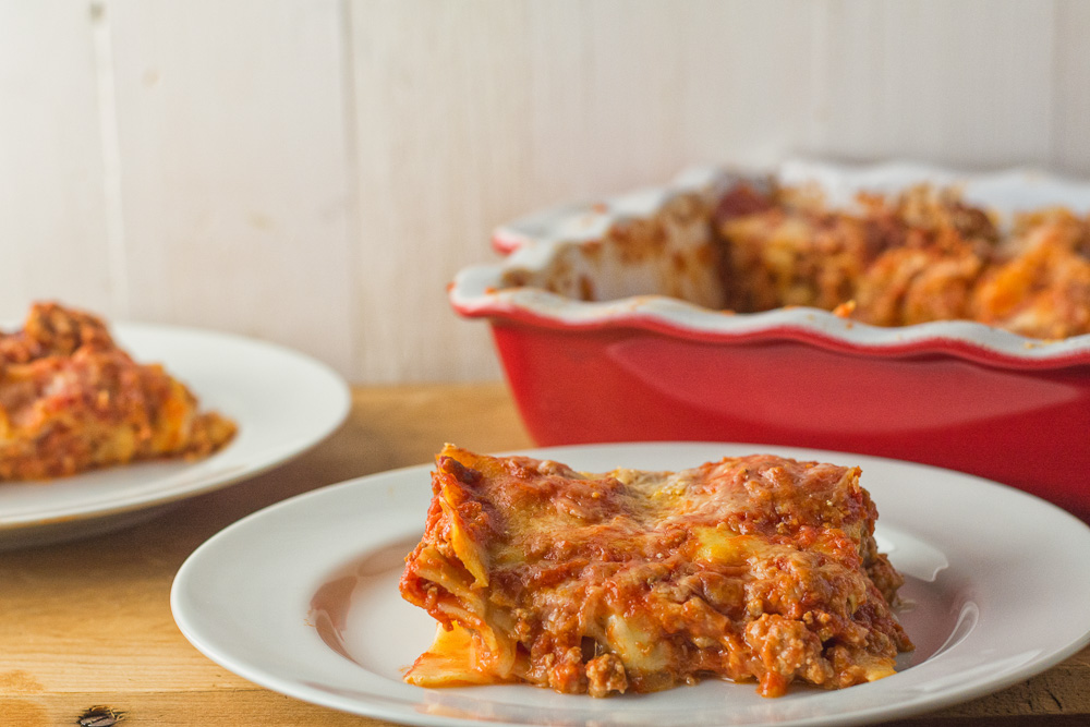 Neapolitan lasagna is a great alternative to your regular lasagna. Pork and Italian sausage meld beautifully with tomato and fresh mozzarella.