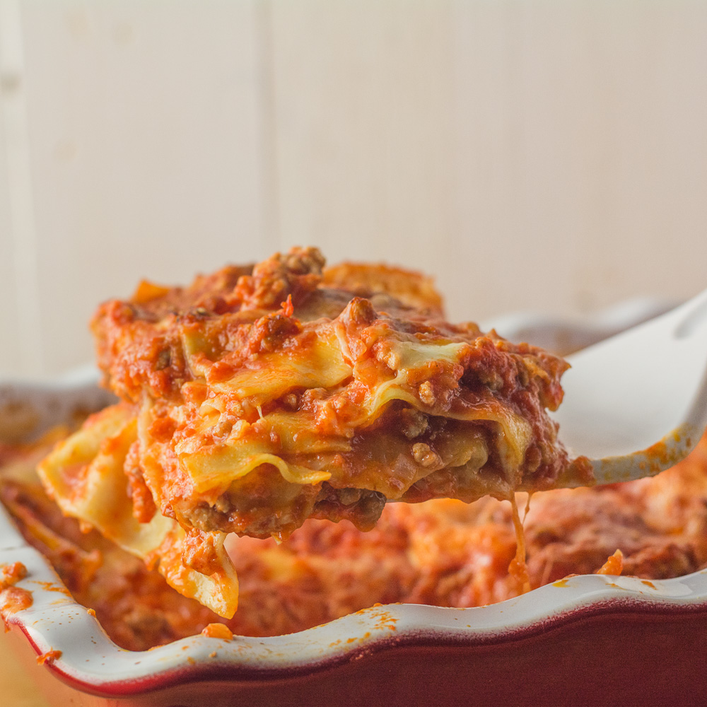 Neapolitan lasagna is a great alternative to your regular lasagna. Pork and Italian sausage meld beautifully with tomato and fresh mozzarella.