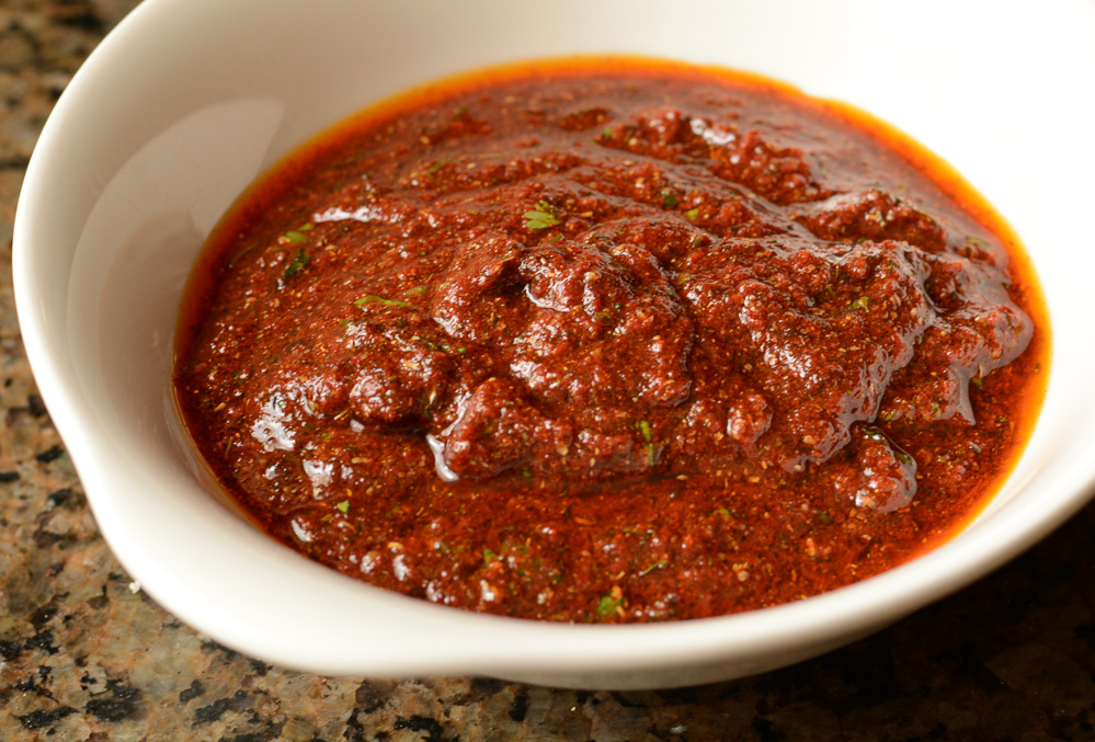 Tandoori marinade in a white bowl.