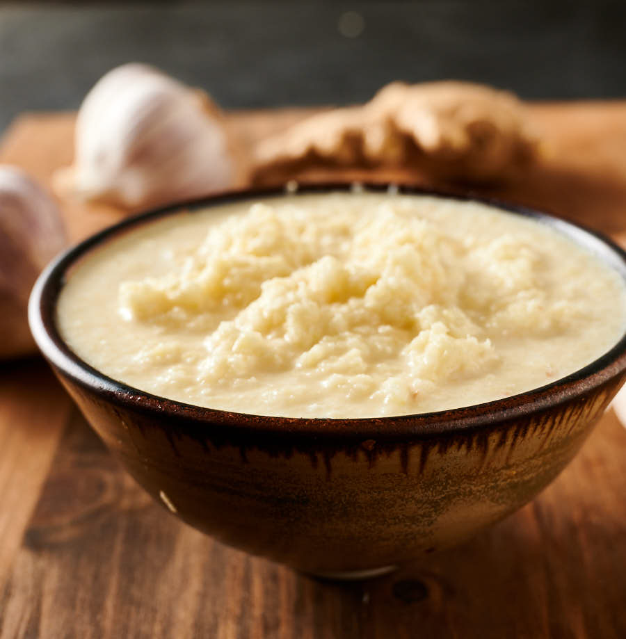 Garlic ginger paste in an Asian bowl from the front.