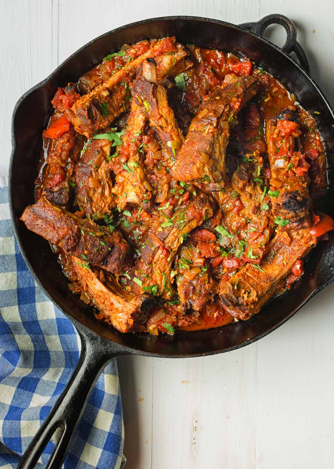 Melting pork back ribs, fire roasted tomatoes and cheese polenta come together in this fine dining riff on Mexican pork chili.