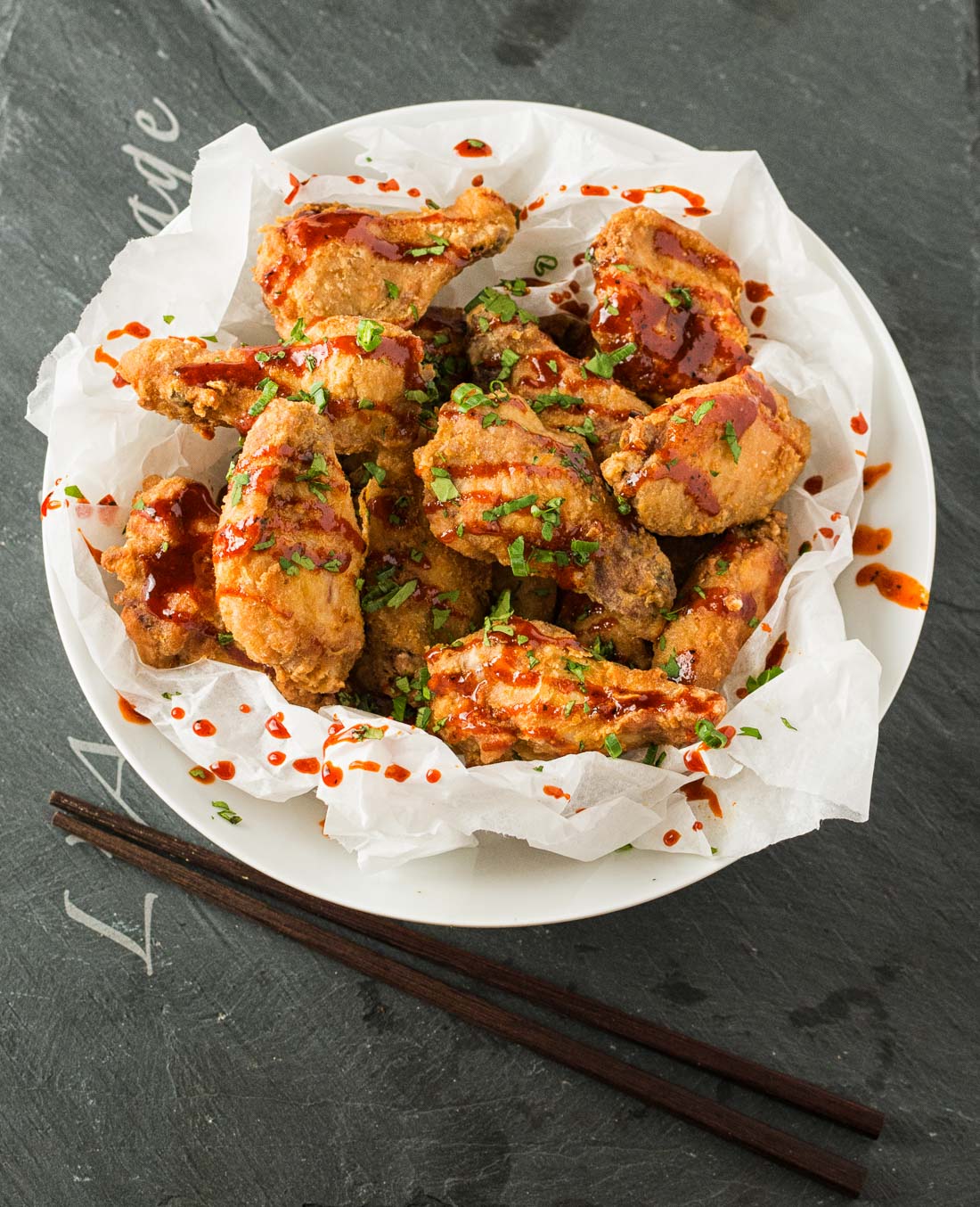 Ultra-crispy make ahead chicken wings with Korean BBQ sauce.