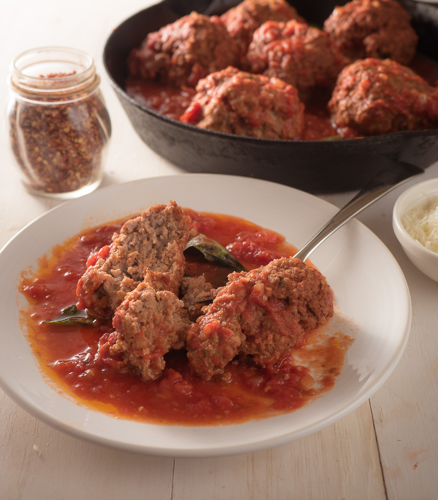 Rao's meatballs on a plate with fork.