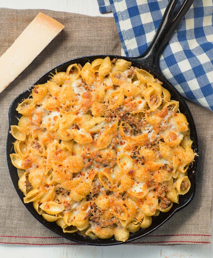 Baked pasta with sausage alfredo sauce is an easy way to get your pasta al forno fix. 