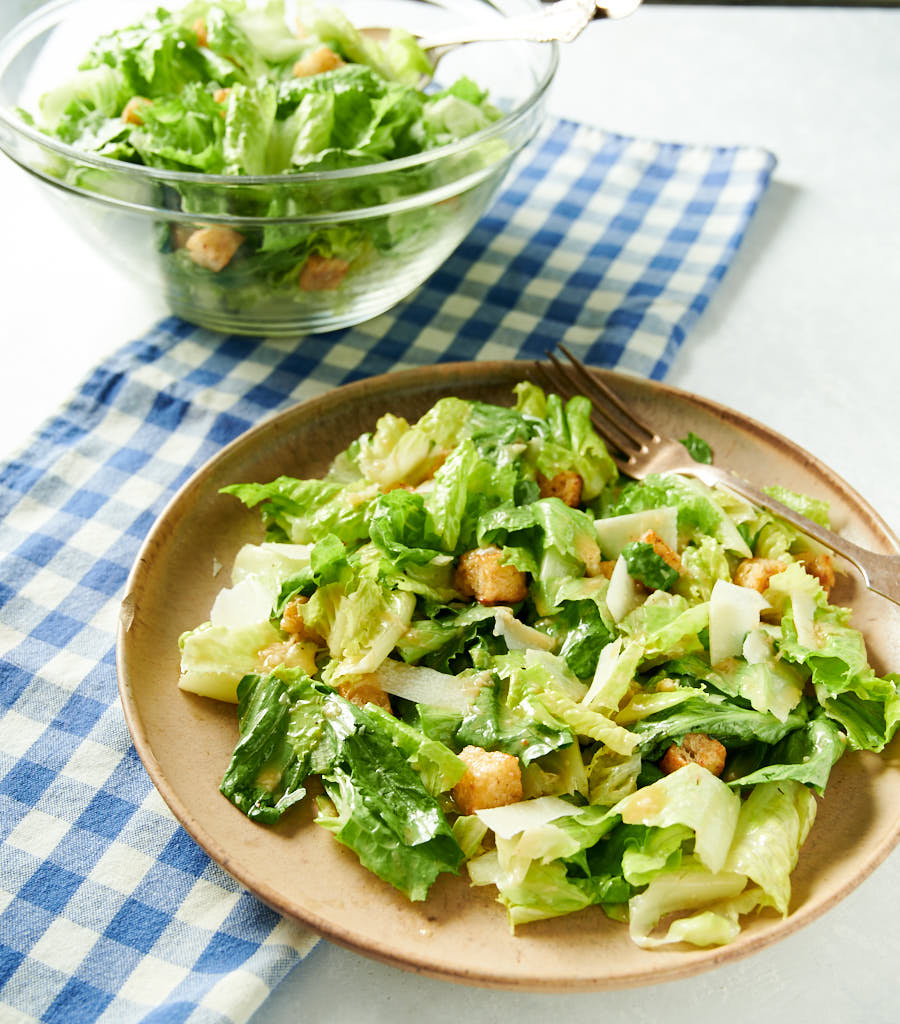 Plate of Caesar salad with fork.