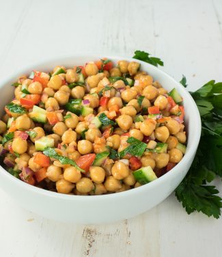 Chickpea salad with sun-dried tomato vinaigrette is the perfect summer side dish.