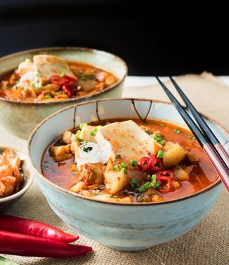 Kimchi jjigae - Korean pork stew is a bowl full of spicy, brothy pork goodness.