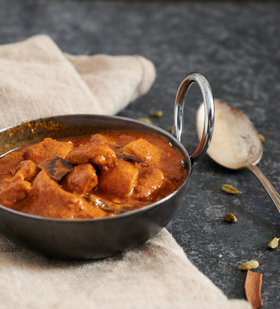 Shahi chicken korma in a bowl from the front.
