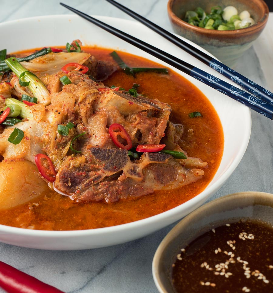 Gamjatang - Korean pork bone soup close up from the front