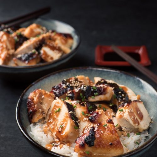 Miso chicken with ginger and maple in a bowl with chopsticks