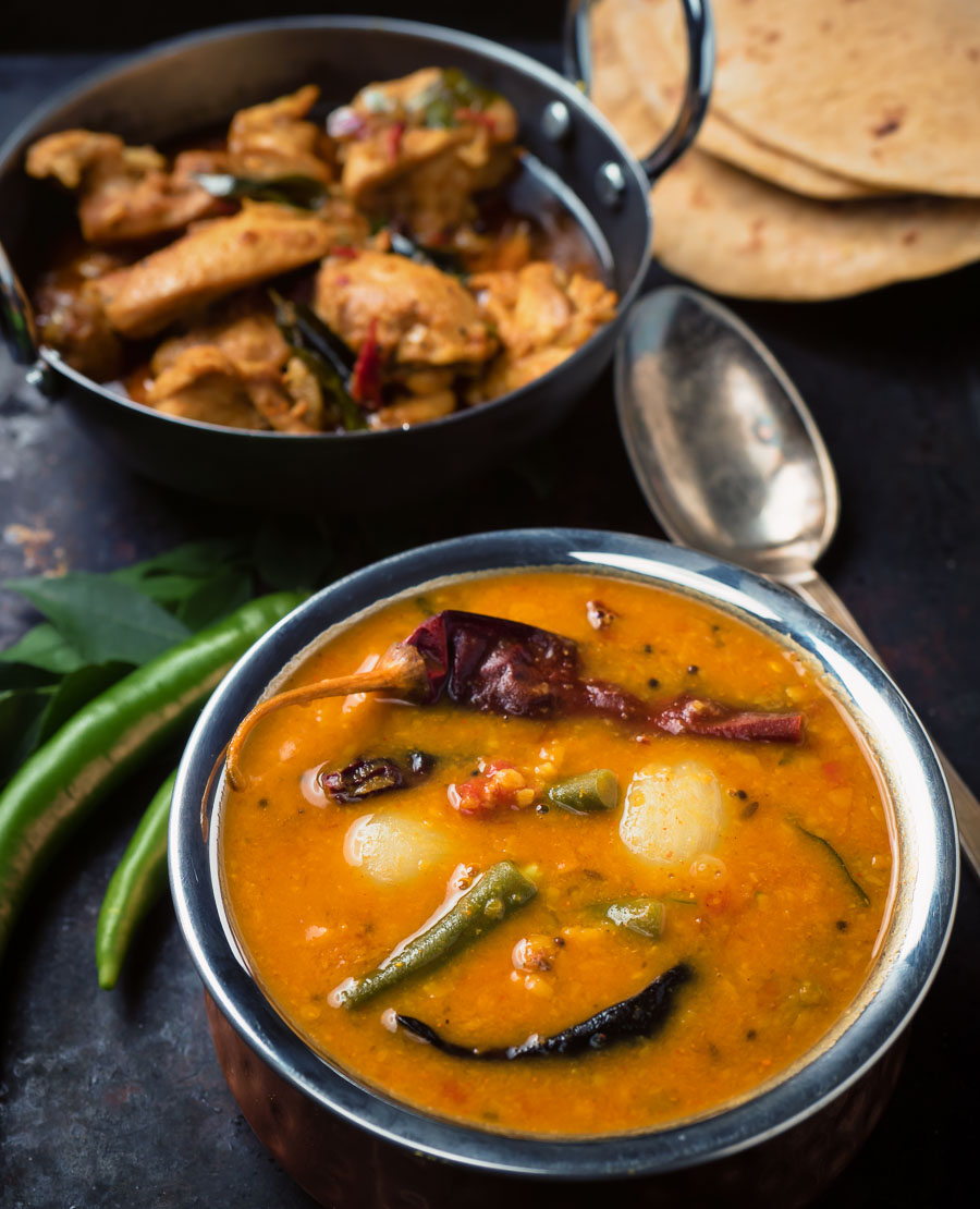 South Indian sambar along side a chicken curry.