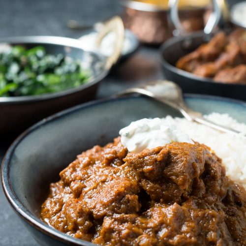 Laal maas curry with rice and raita