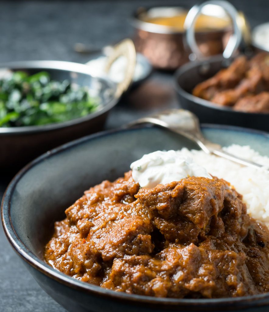 Laal maas curry with rice and raita