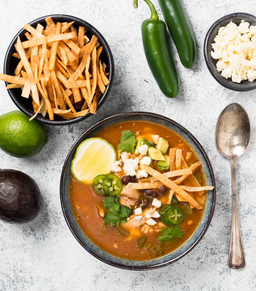 Chicken tortilla soup and garnishes from above.