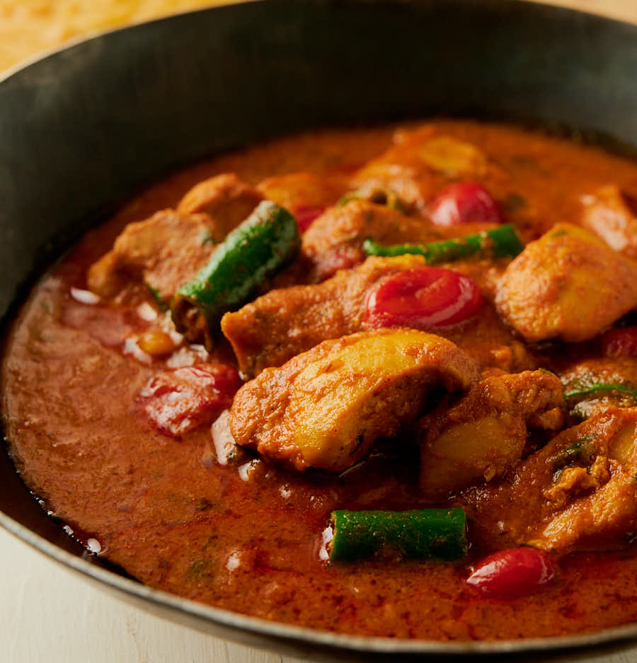 close up of chicken masala curry from the front