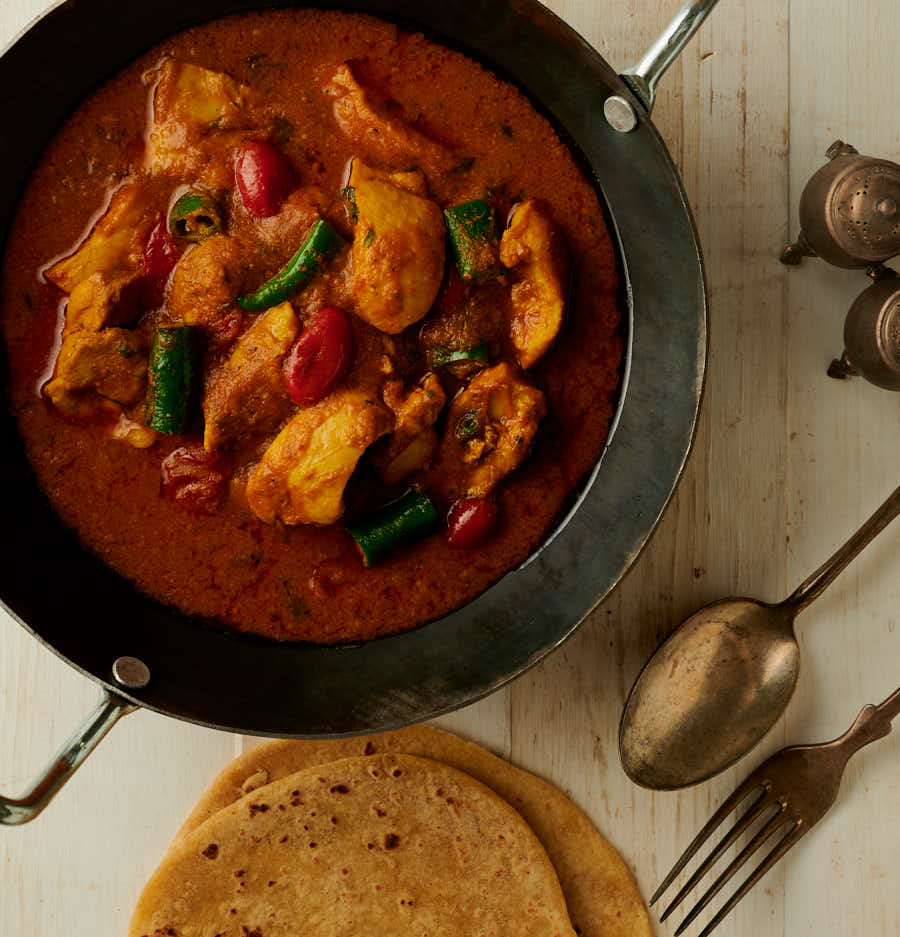 chicken masala curry and chapati from above