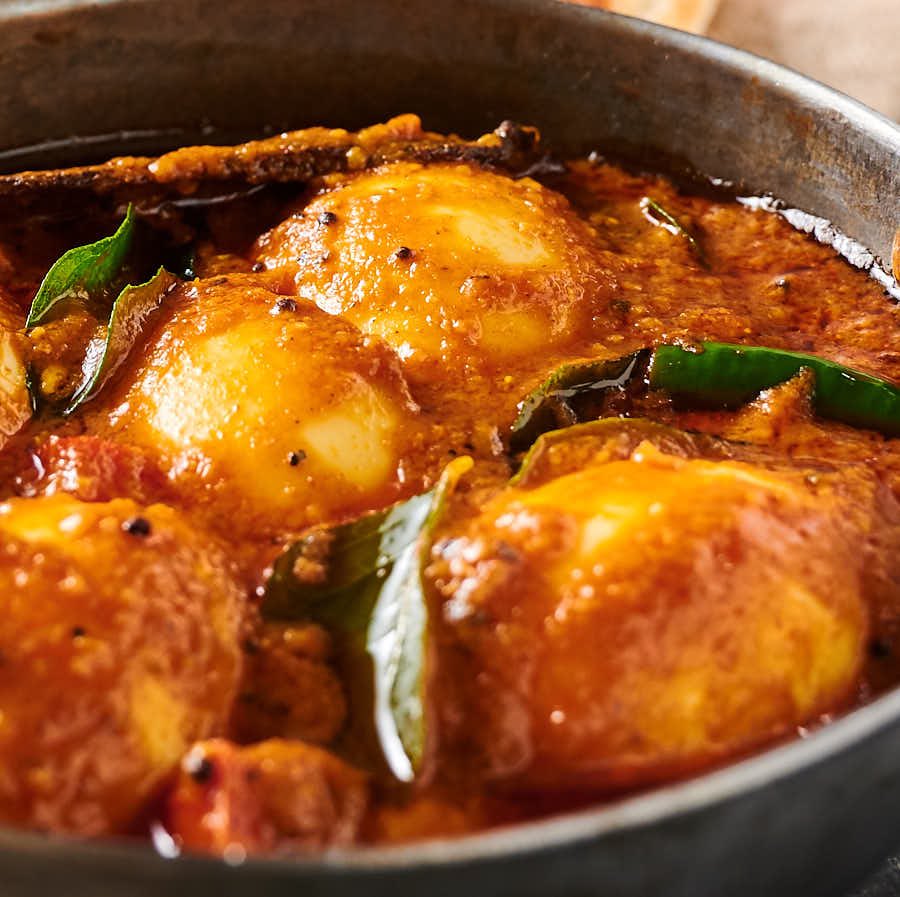 Close-up of egg curry from the front.