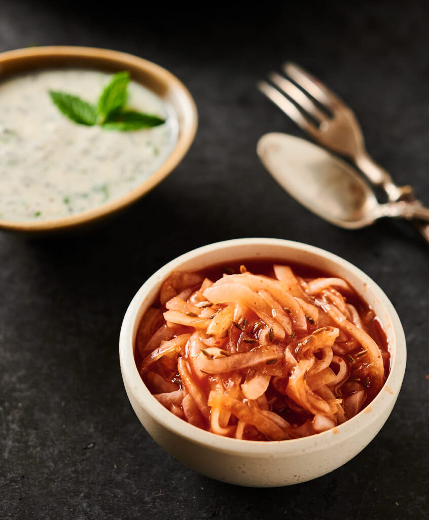 Bowl of red onion chutney from the front.