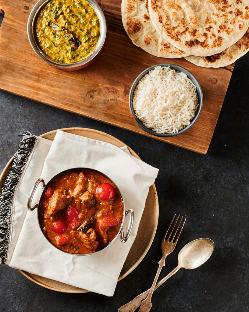 Lamb rogan josh, rice, dal palak and parathas from above.