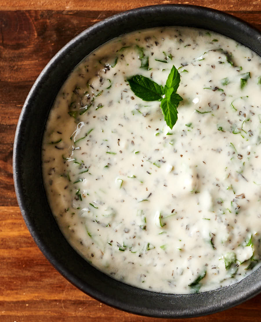 Closeup of a bowl of mint raita from above.