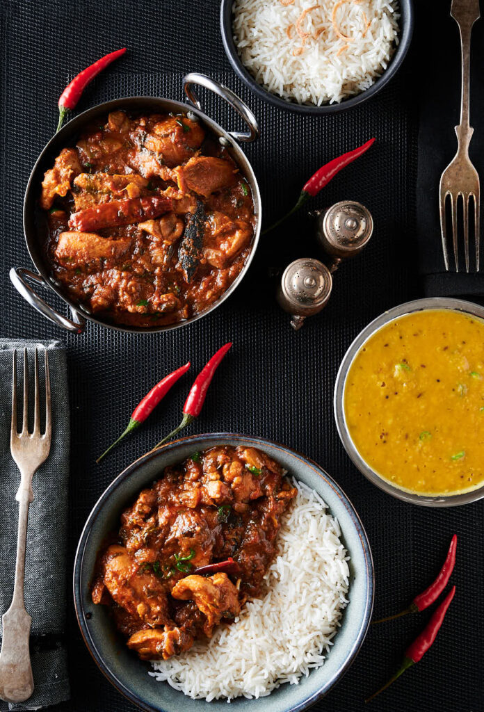 Chicken bhuna, dahl and bowl of bhuna and rice from above.