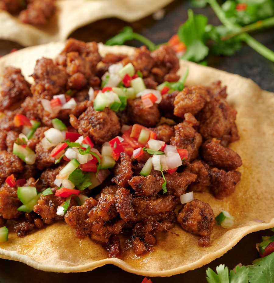 Close-up of a keema papadum from the front.