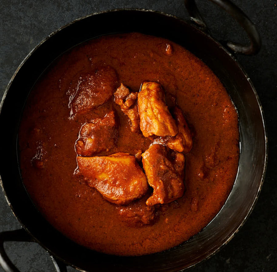 chicken pathia in a kadai from above.
