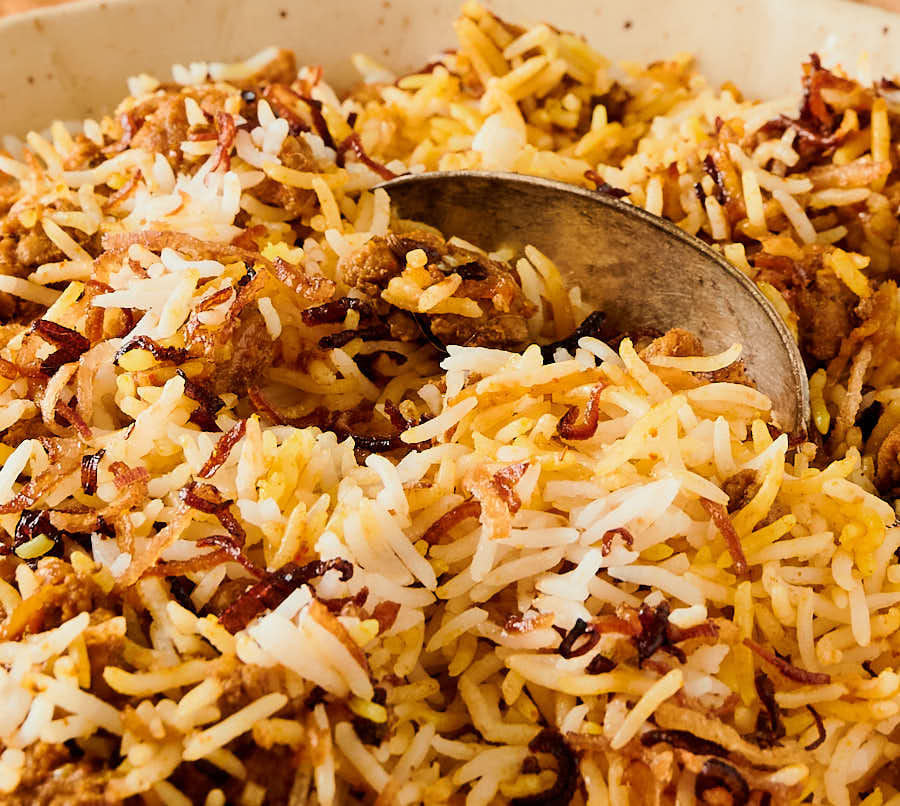 closeup of keema rice with spoon from the front