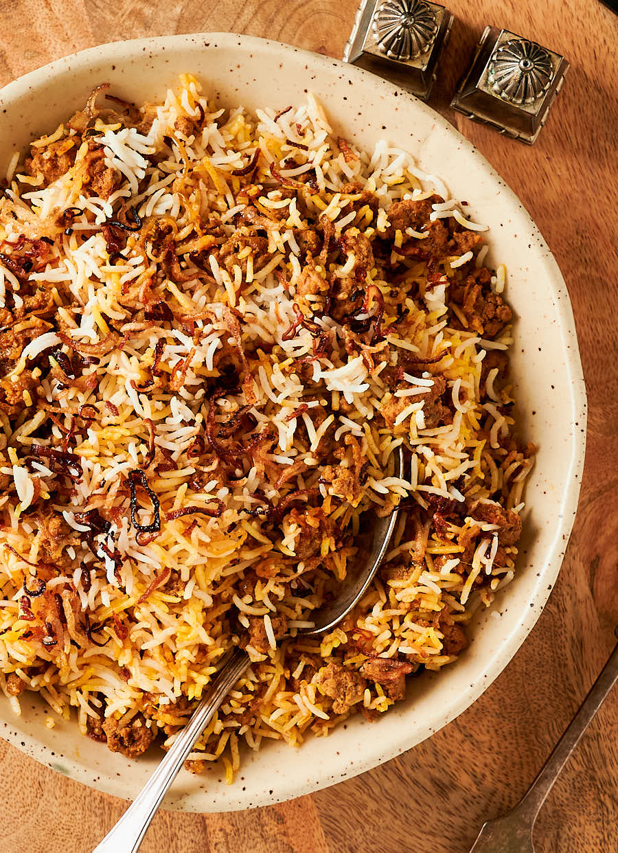 bowl of keema rice with serving spoon