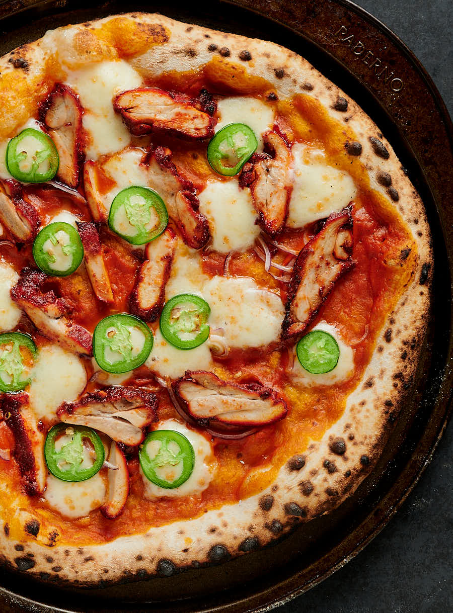 pizza before drizzle and cilantro garnish