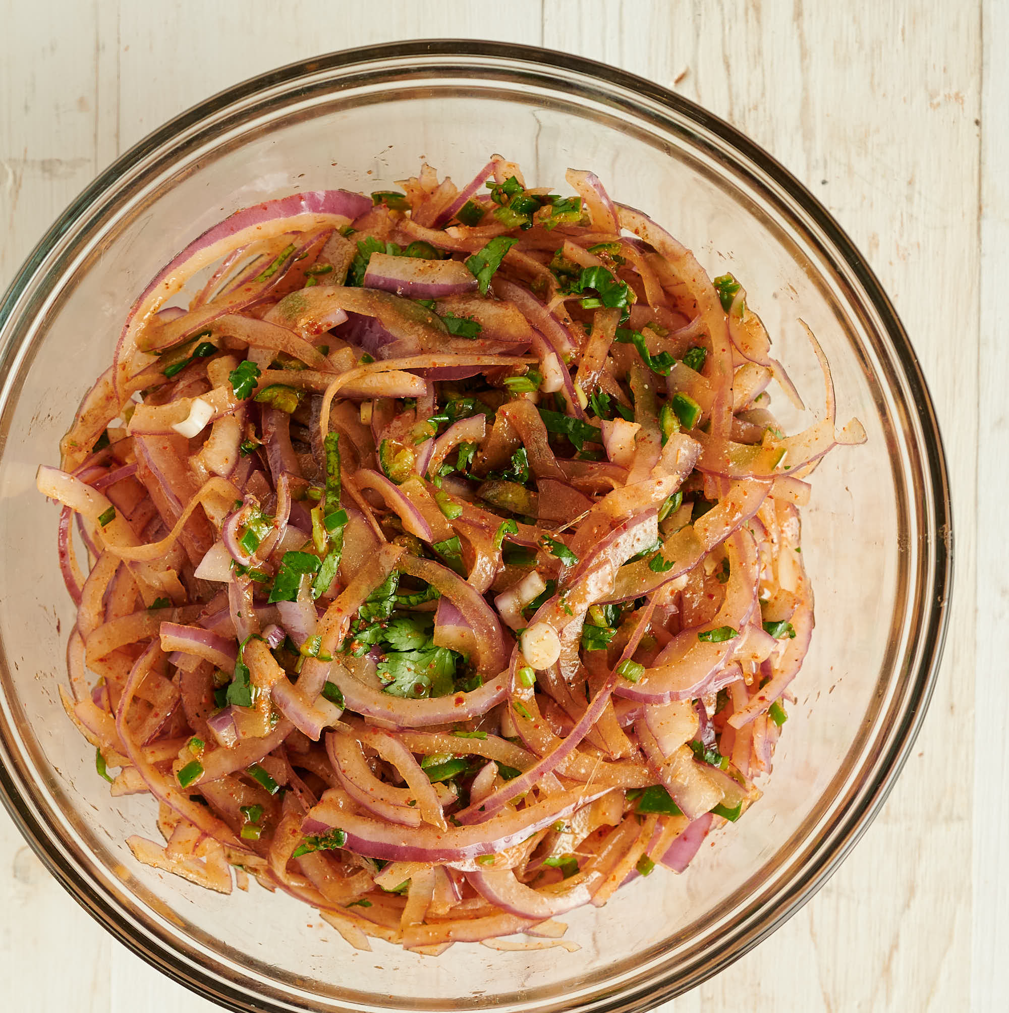 Indian onion salad in clear bowl from above