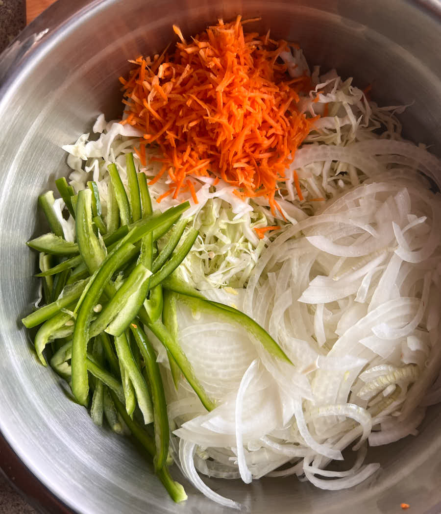 Coleslaw shredded vegetables in a bowl from above