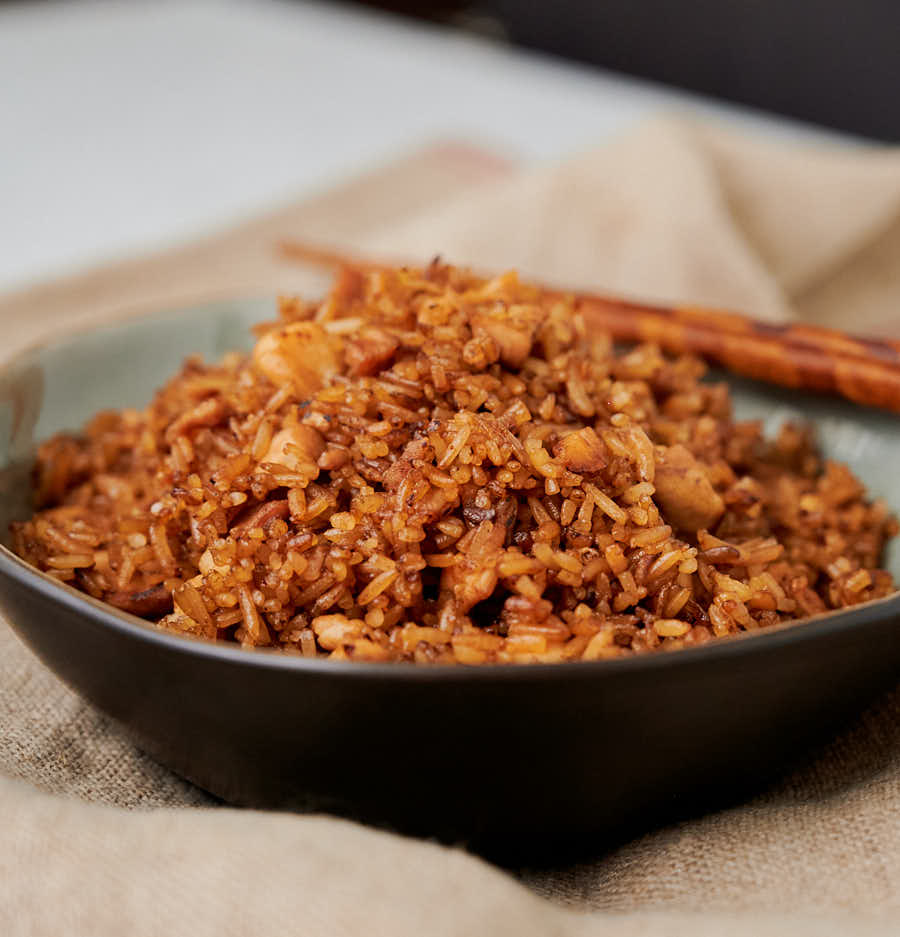 Chicken fried rice with chopsticks from the front.