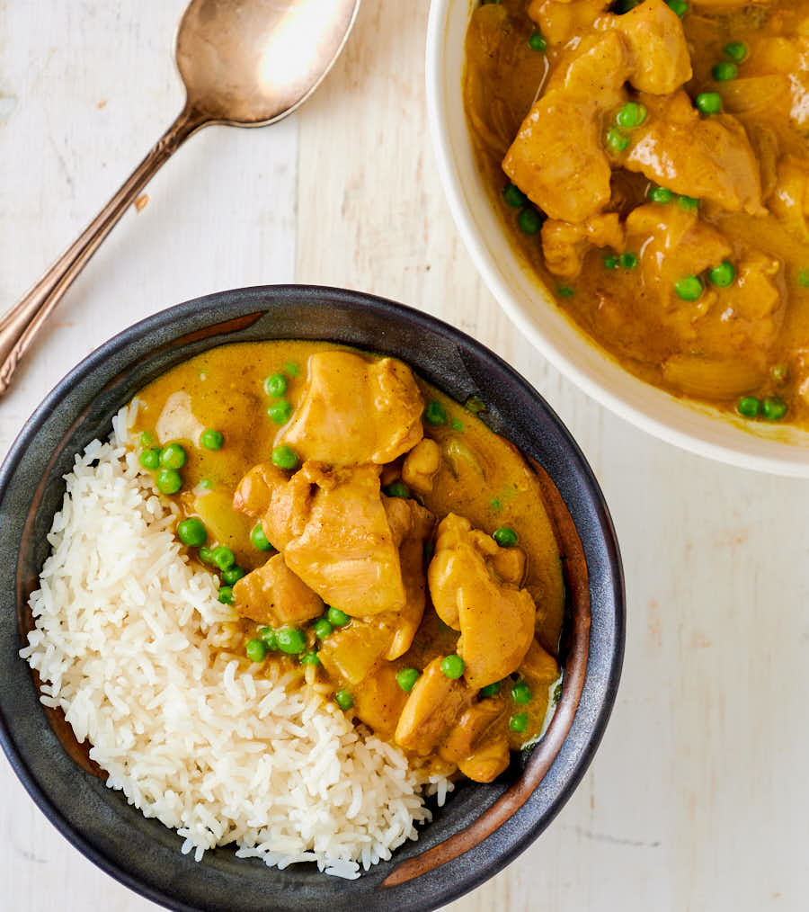 Serving of Chinese chicken curry table scene from above