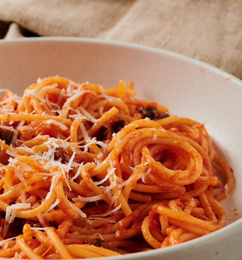 bowl of spaghetti all'amatriciana from the front